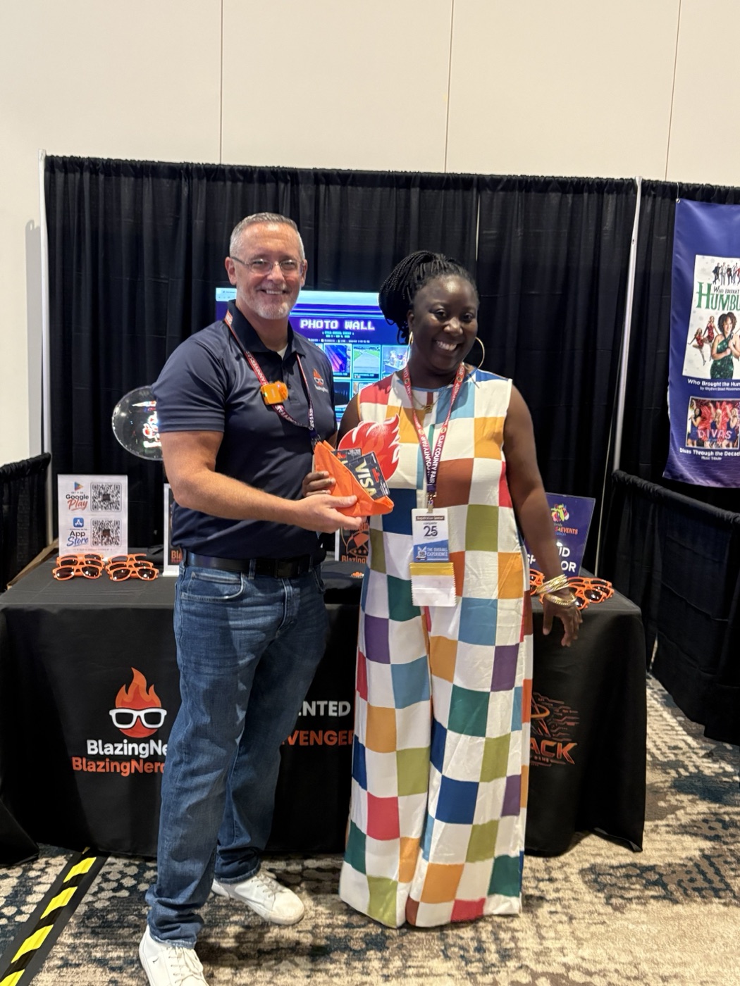 A Haystack gift card winner at the BlazingNerd booth